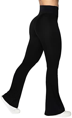 Person wearing black flared yoga pants and white sneakers.