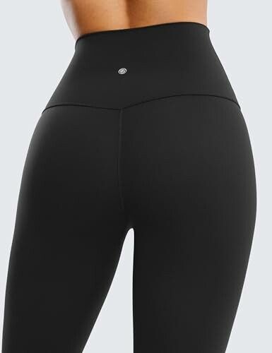 Black high-waist leggings from the back view.