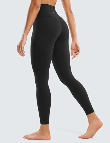 Woman wearing black leggings