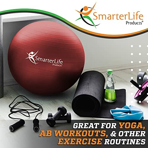 Exercise equipment set with yoga ball, dumbbells, and mat.