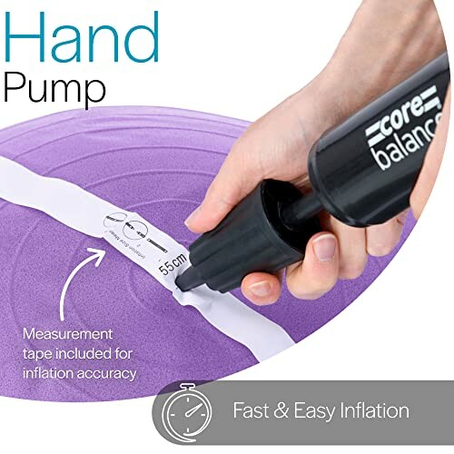 Hand pump inflating a purple exercise ball with measurement tape.