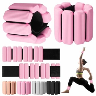 Pink ankle and wrist weights with a person exercising.